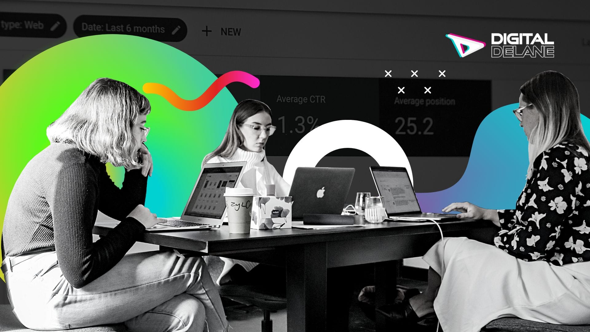 Professional marketers sitting around a table working on paid search tasks