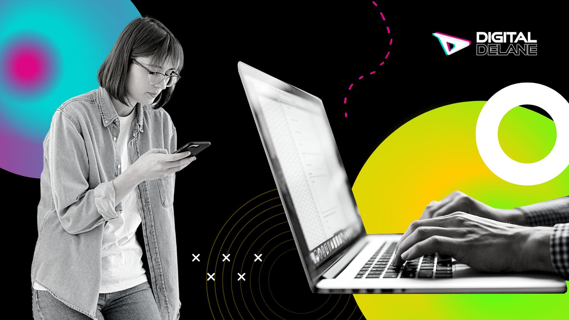 Man typing at laptop computer and girl checking her phone next to him