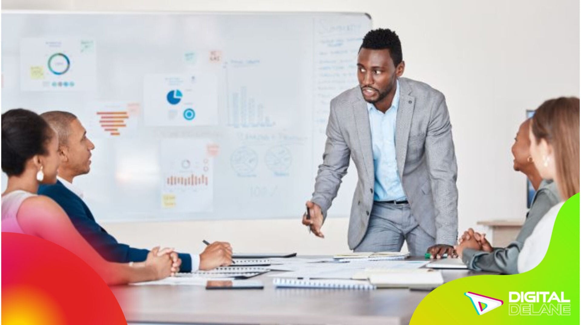 A man in a suit presents to colleagues, showcasing modern strategies for engaging social media campaigns.