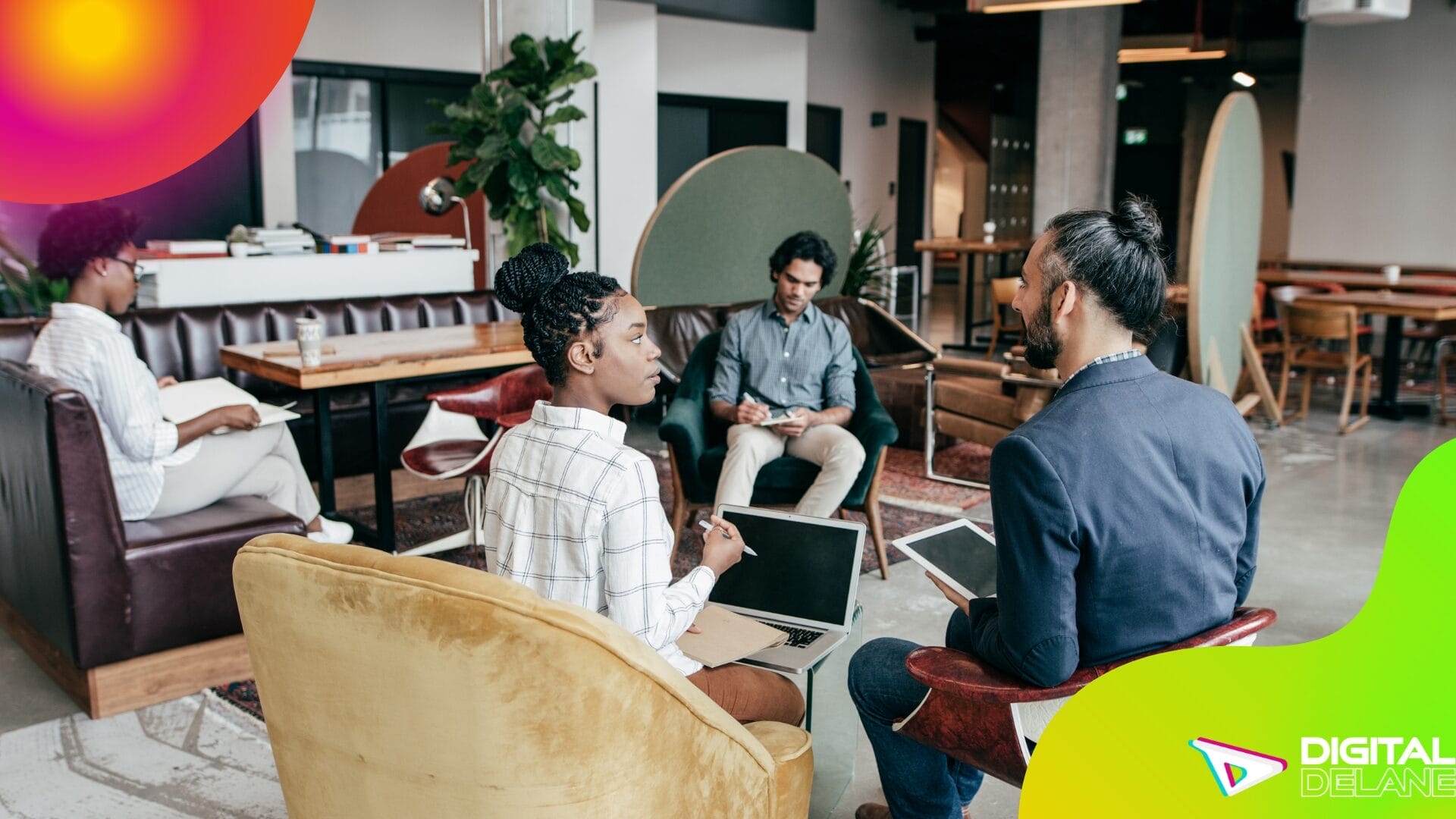 People seated in a room discussing digital marketing strategies and solutions for effective email campaigns.