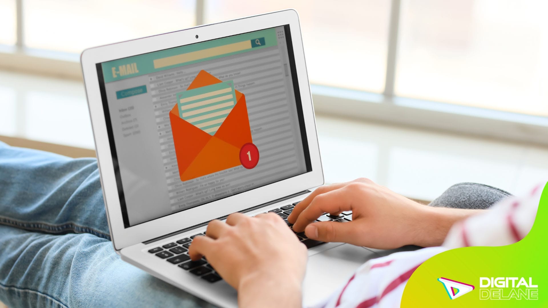 A person types on a laptop, composing an email to engage subscribers with personalized content.