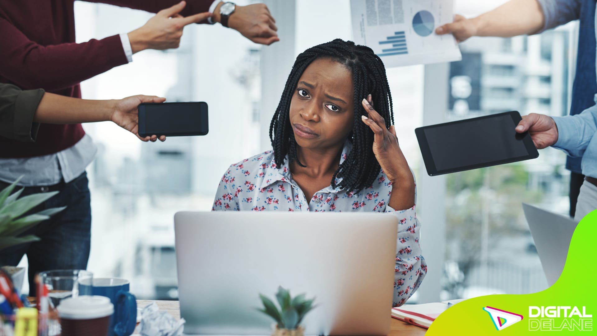 A woman appears frustrated, holding her head while looking at a laptop, symbolizing challenges with mobile usability.