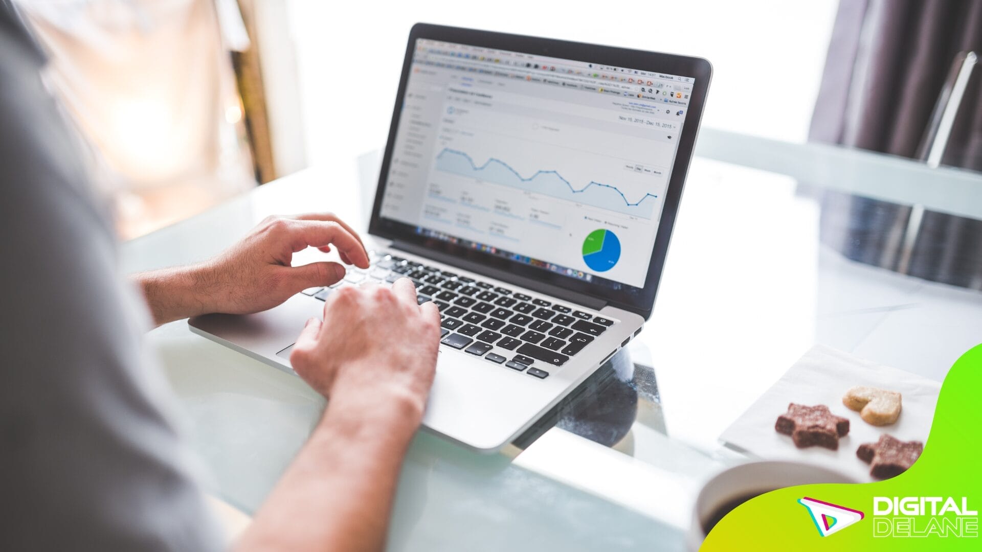 A person analyzes local traffic data on a laptop, utilizing analytics tools to enhance lead engagement strategies.