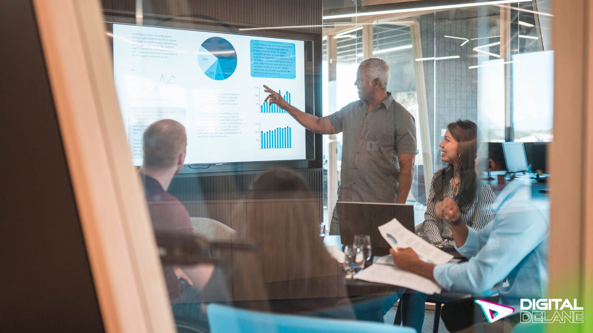 A man presents to an audience, sharing insights on effective digital marketing strategies and campaign engagement.