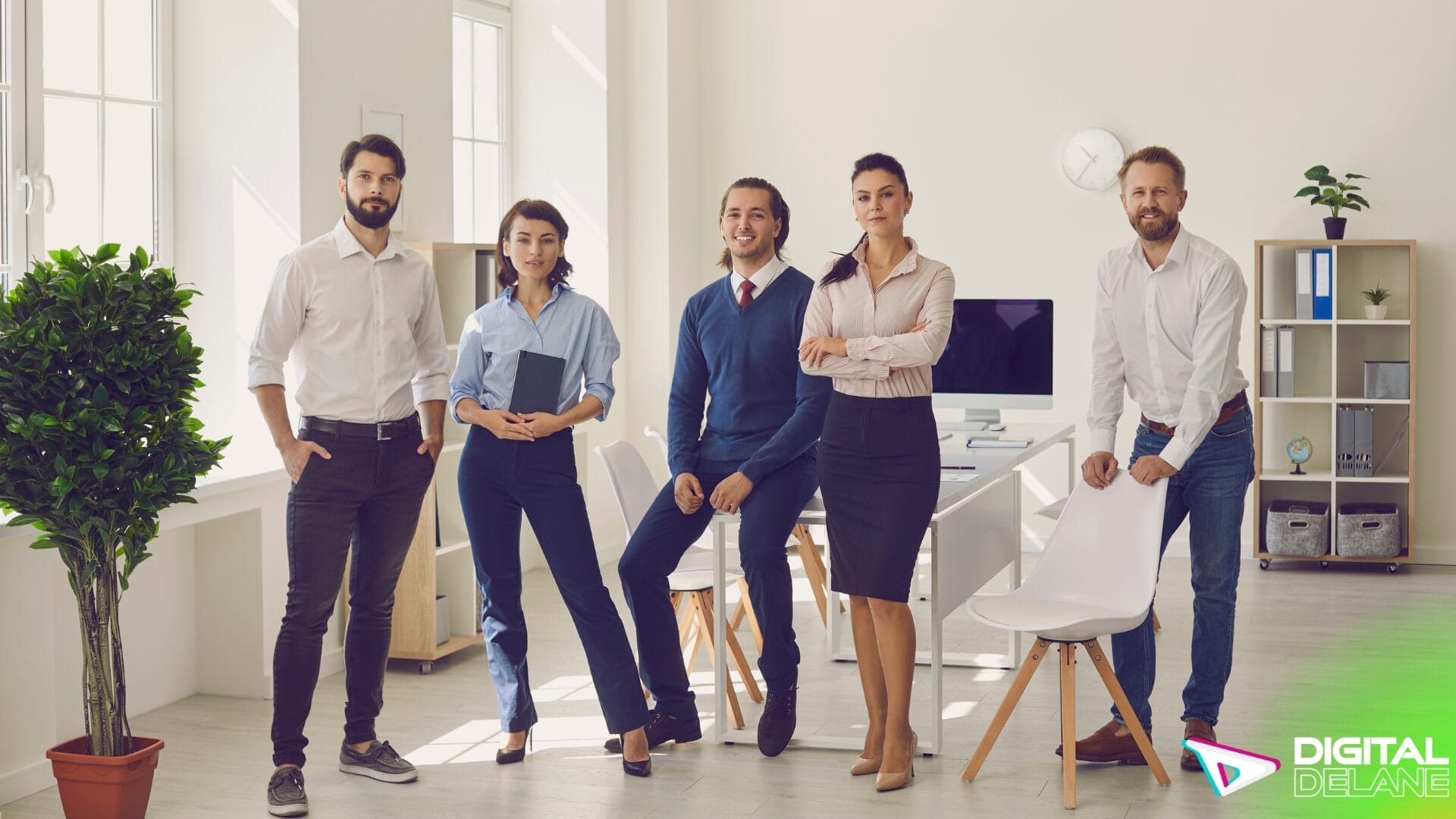 A group of business professionals collaborating in a modern office environment, discussing strategies and goals.
